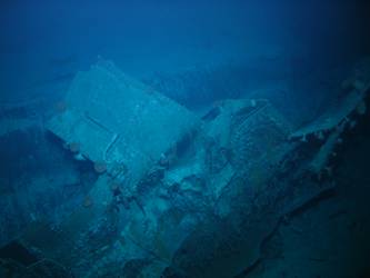 Large pieces of twisted steel plate on seabed